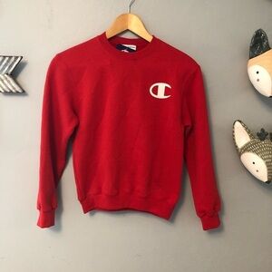Champion red sweatshirt new with tags size small. Cute for Valentine’s Day.